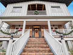 Gorgeous Brick Entrance to Covered Porch and Home